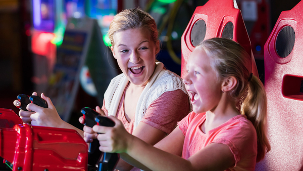 NCL-Arcade-Package-Girl-Playing-Arcade-jpg